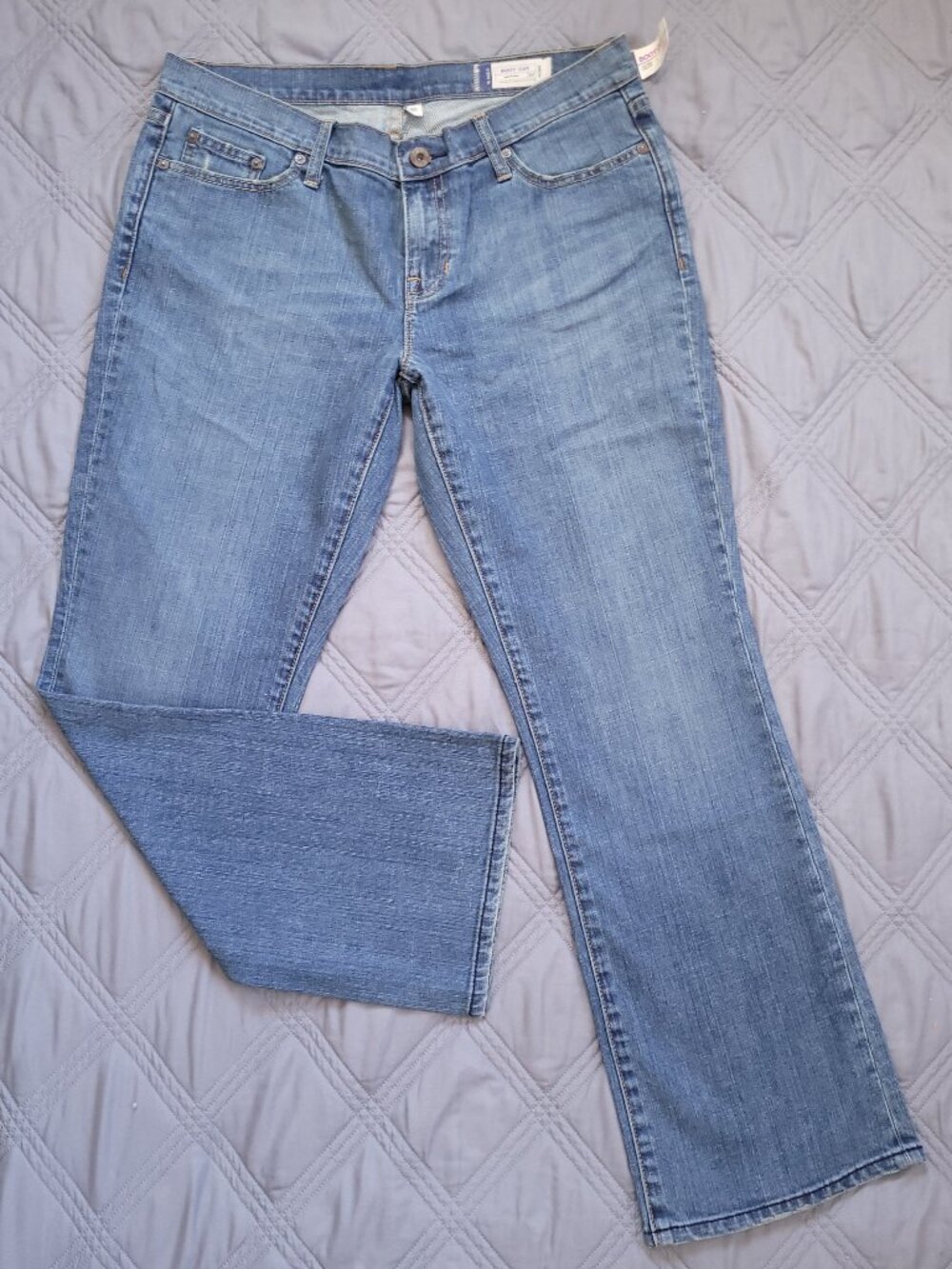 New Gap jeans-low rise, boot cut, stretch in faded medium rinse.